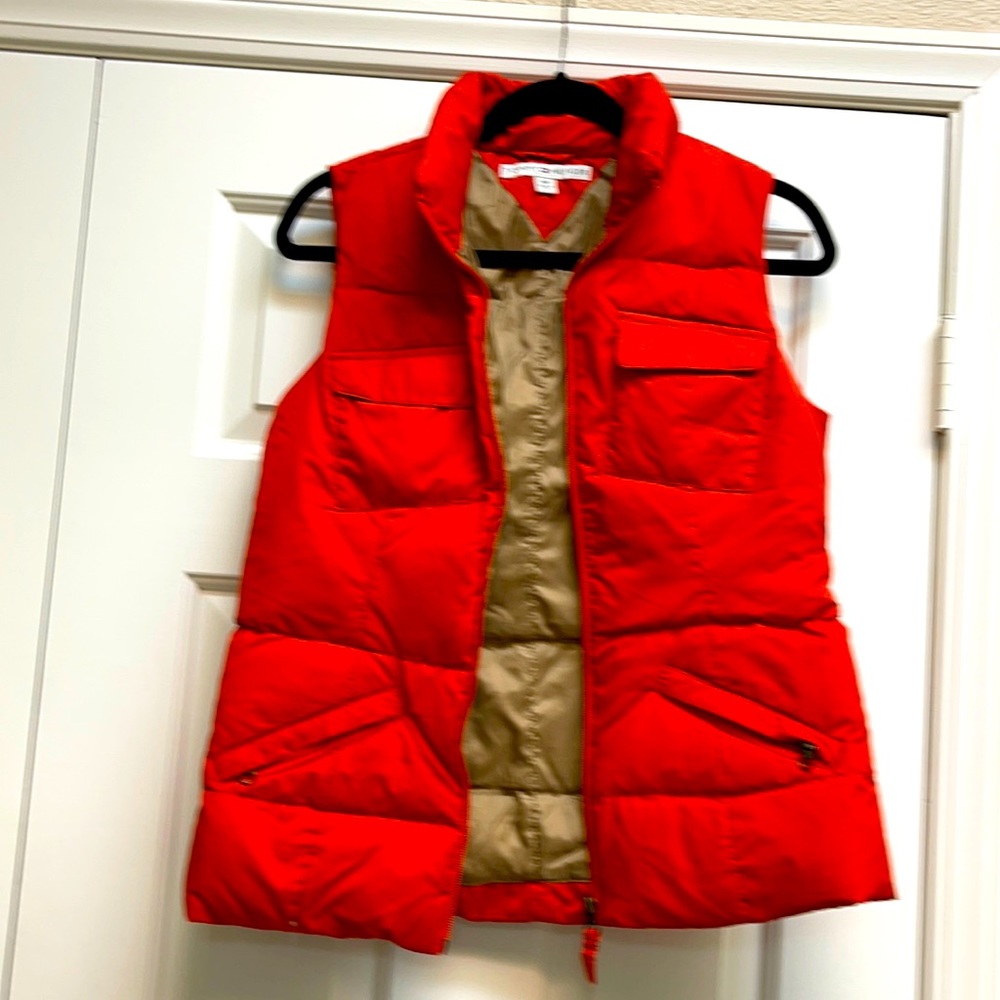 Tommy Hilfiger orange puffer vest size small.